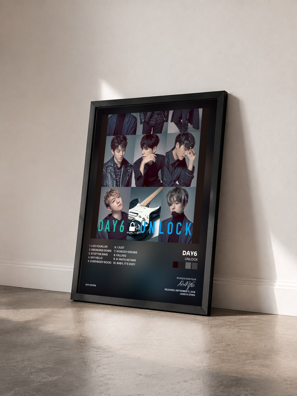#noir Tableau de l'album UNLOCK de DAY6  vu de trois quarts, cadre noir