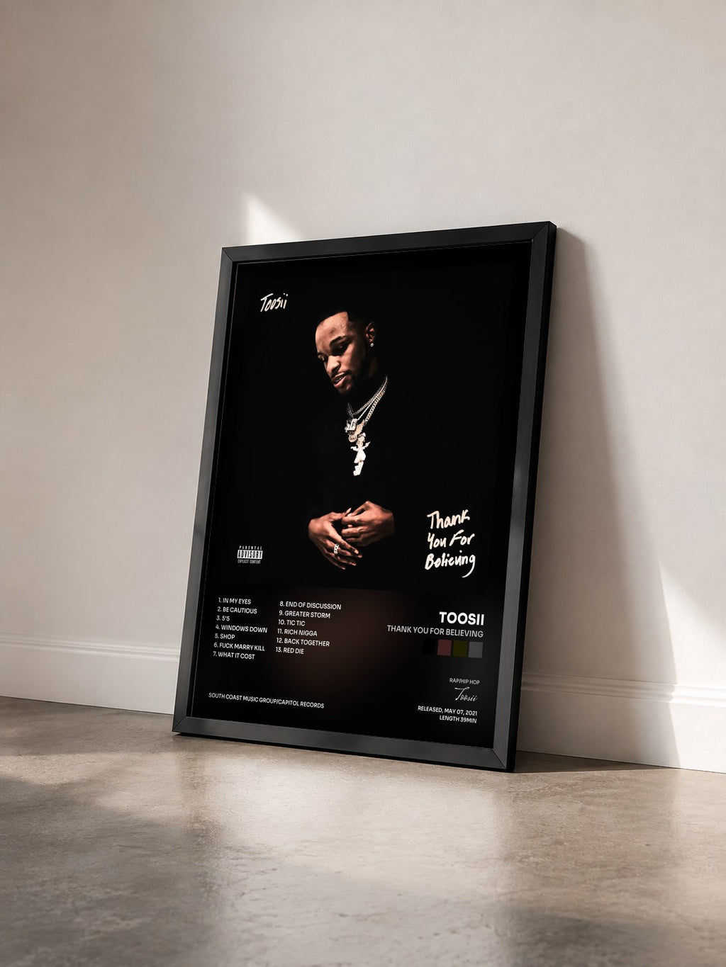 #noir Tableau de l'album Thank You For Believing de Toosii vu de trois quarts, cadre noir