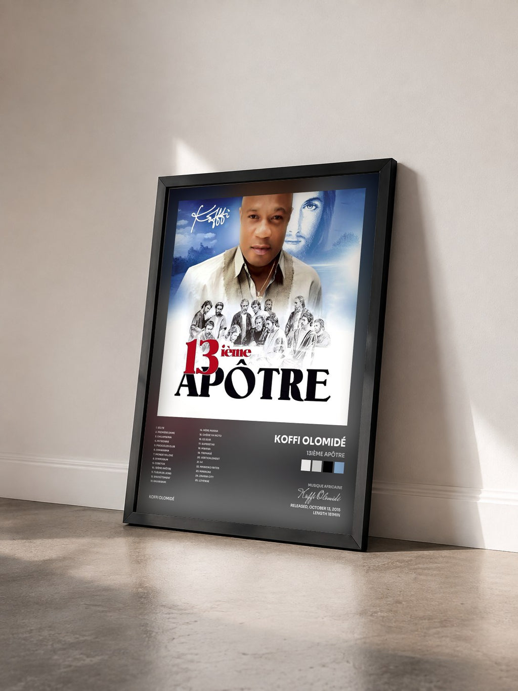 #noir Tableau de l'album 13ième apôtre de Koffi Olomidé vu de trois quarts, cadre noir