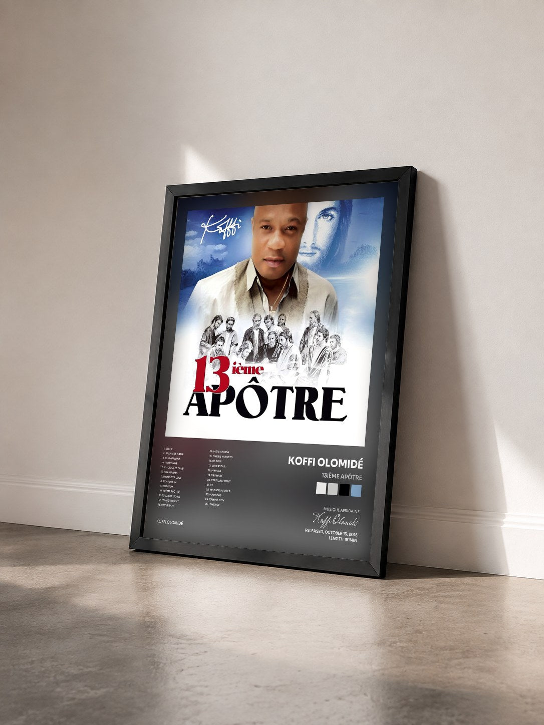 #noir Tableau de l'album 13ième apôtre de Koffi Olomidé vu de trois quarts, cadre noir