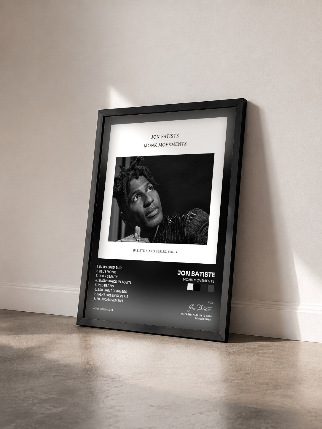 #noir Tableau de l'album Monk Movements de Jon Batiste vu de trois quarts, cadre noir