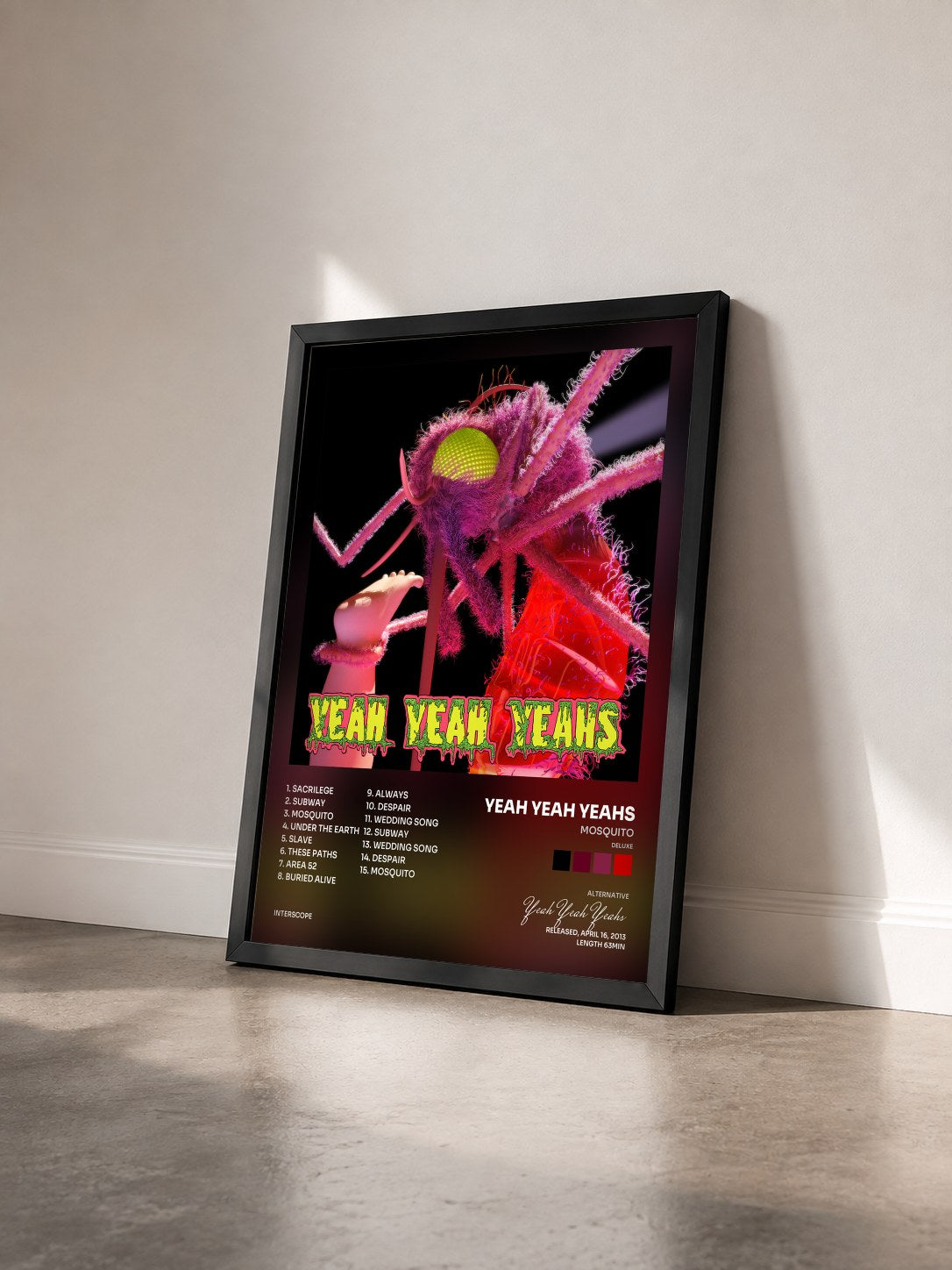 #noir Tableau de l'album Mosquito (Deluxe) de Yeah Yeah Yeahs vu de trois quarts, cadre noir