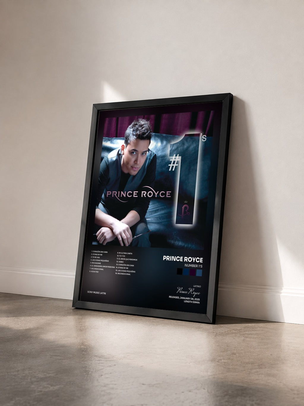 #noir Tableau de l'album Number 1's de Prince Royce vu de trois quarts, cadre noir