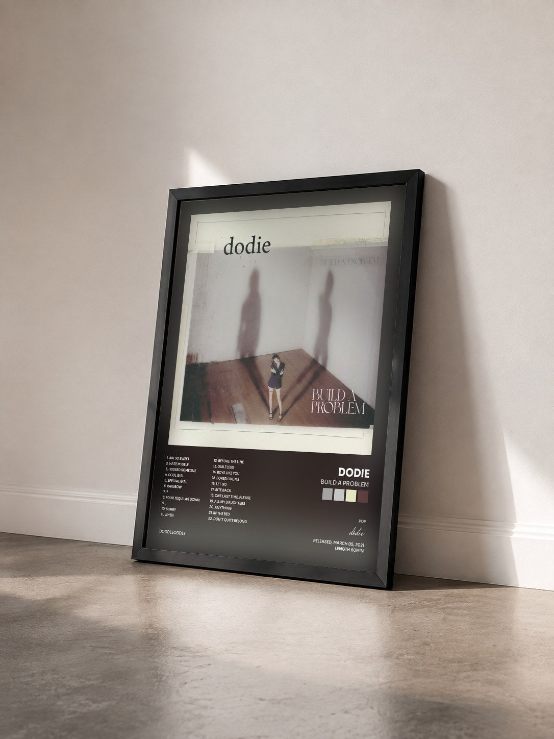 #noir Tableau de l'album Build A Problem de dodie vu de trois quarts, cadre noir