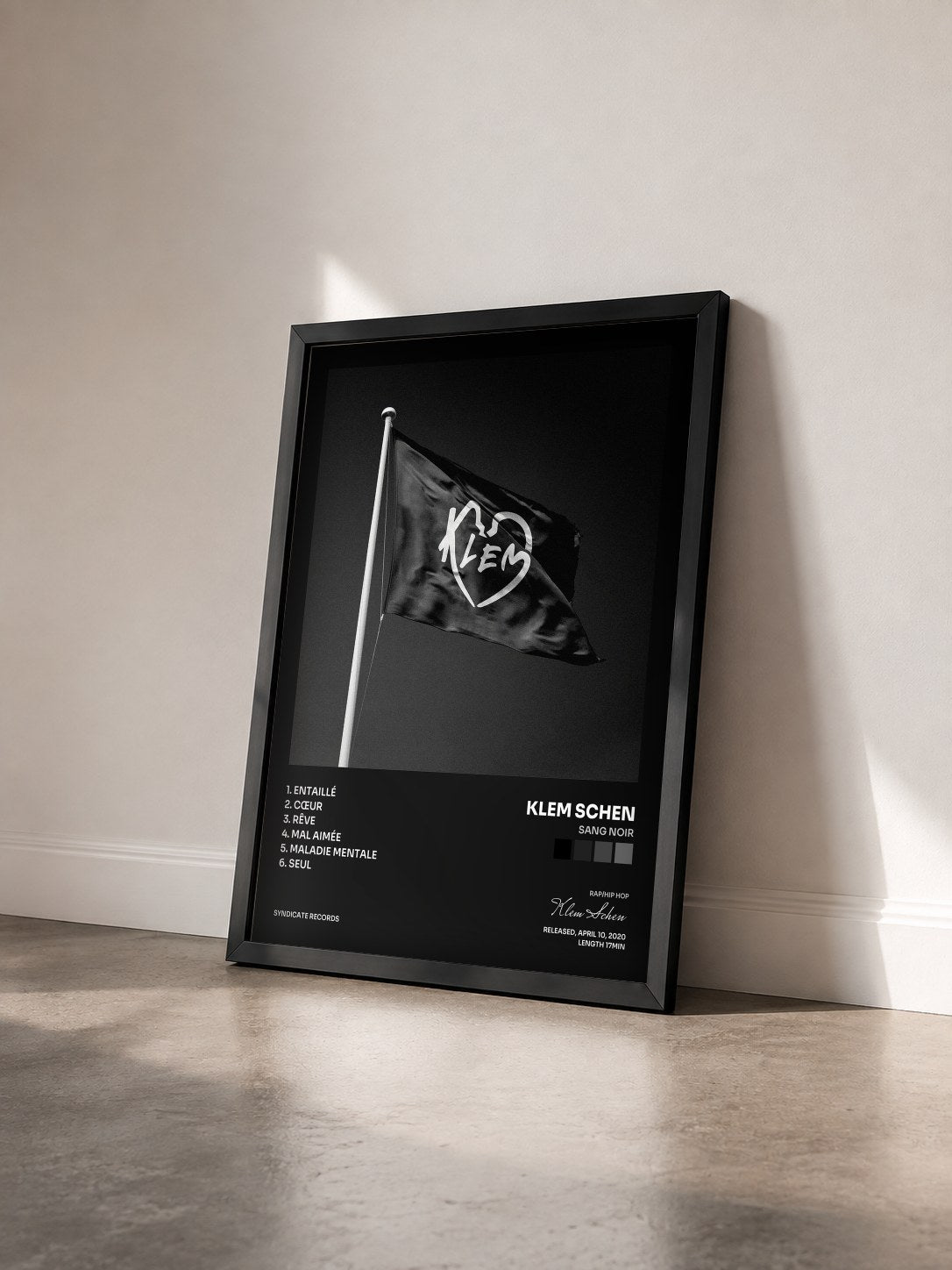 #noir Tableau de l'album Sang noir de Klem Schen vu de trois quarts, cadre noir
