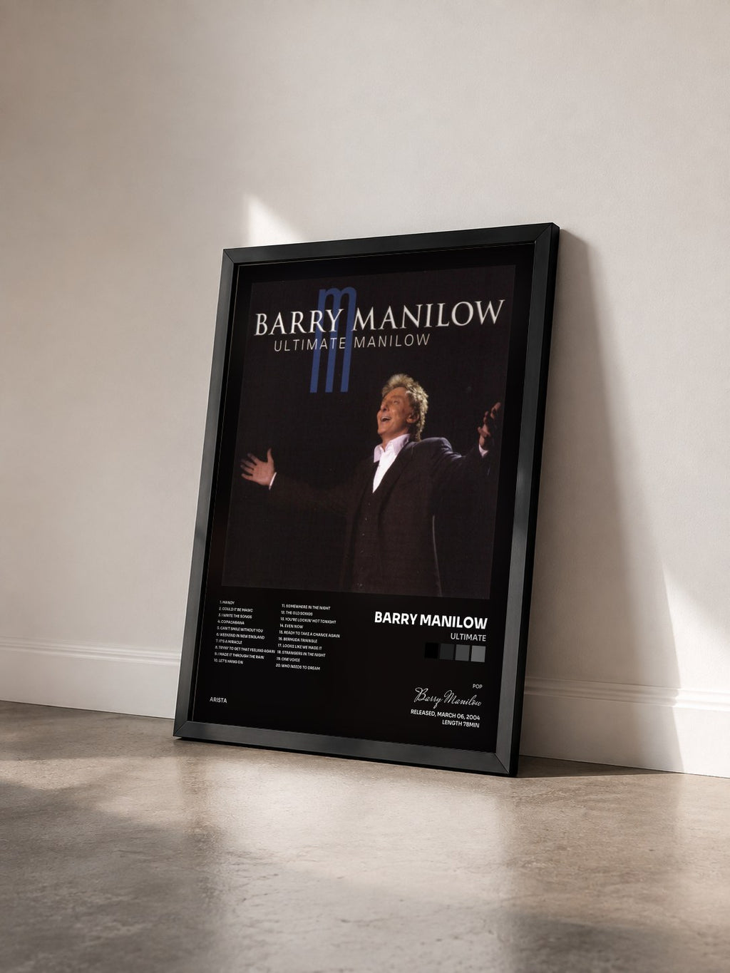 #noir Tableau de l'album Ultimate de Barry Manilow vu de trois quarts, cadre noir