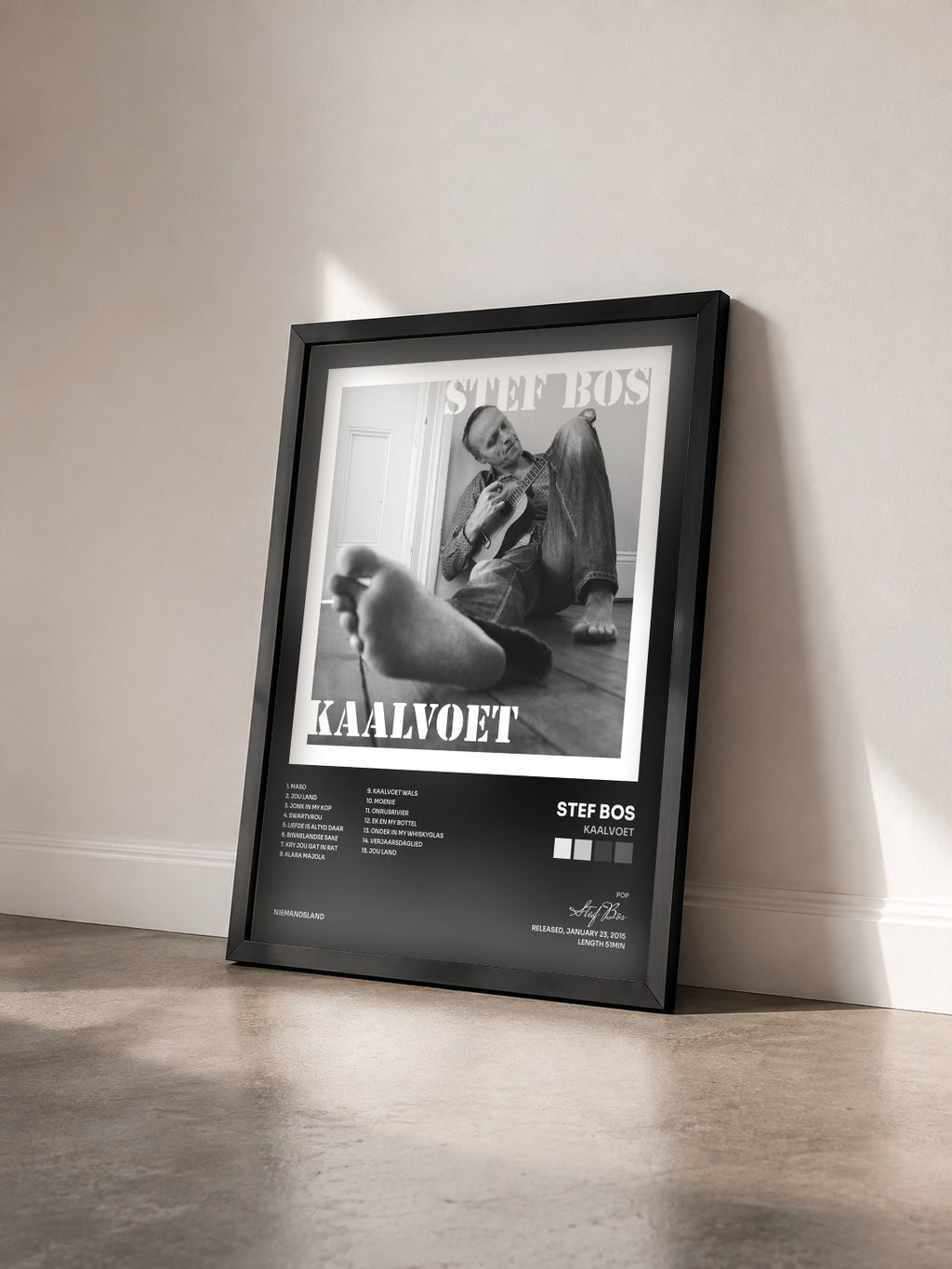 #noir Tableau de l'album Kaalvoet de Stef Bos vu de trois quarts, cadre noir