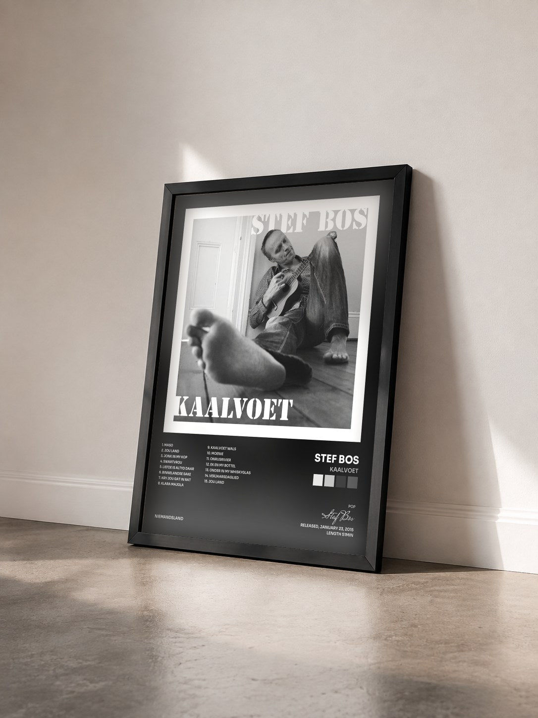 #noir Tableau de l'album Kaalvoet de Stef Bos vu de trois quarts, cadre noir