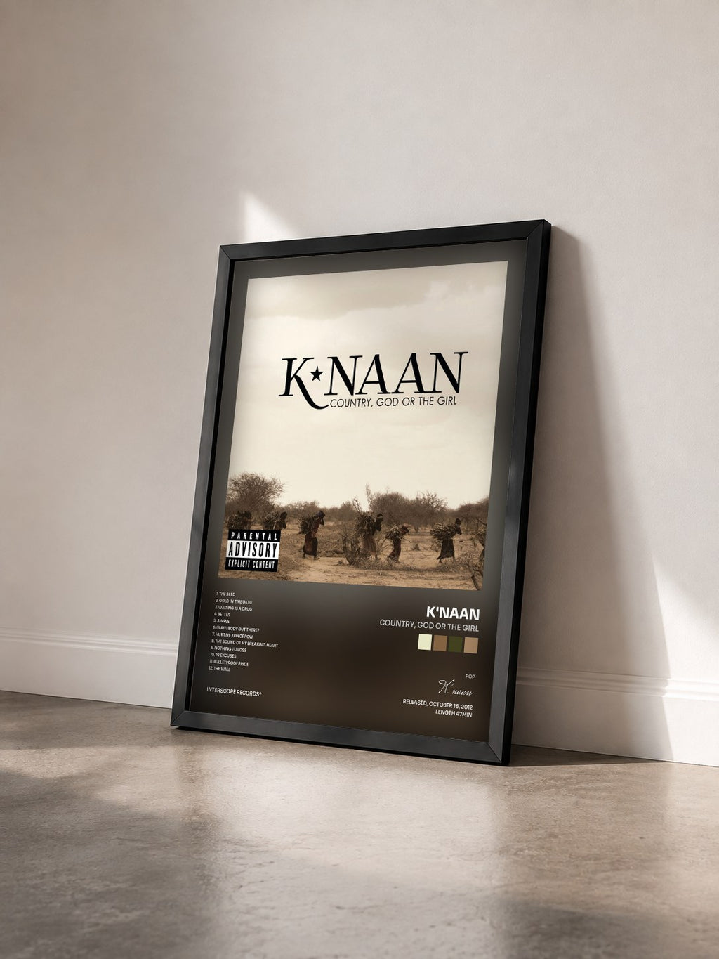 #noir Tableau de l'album Country, God Or The Girl de K'naan vu de trois quarts, cadre noir