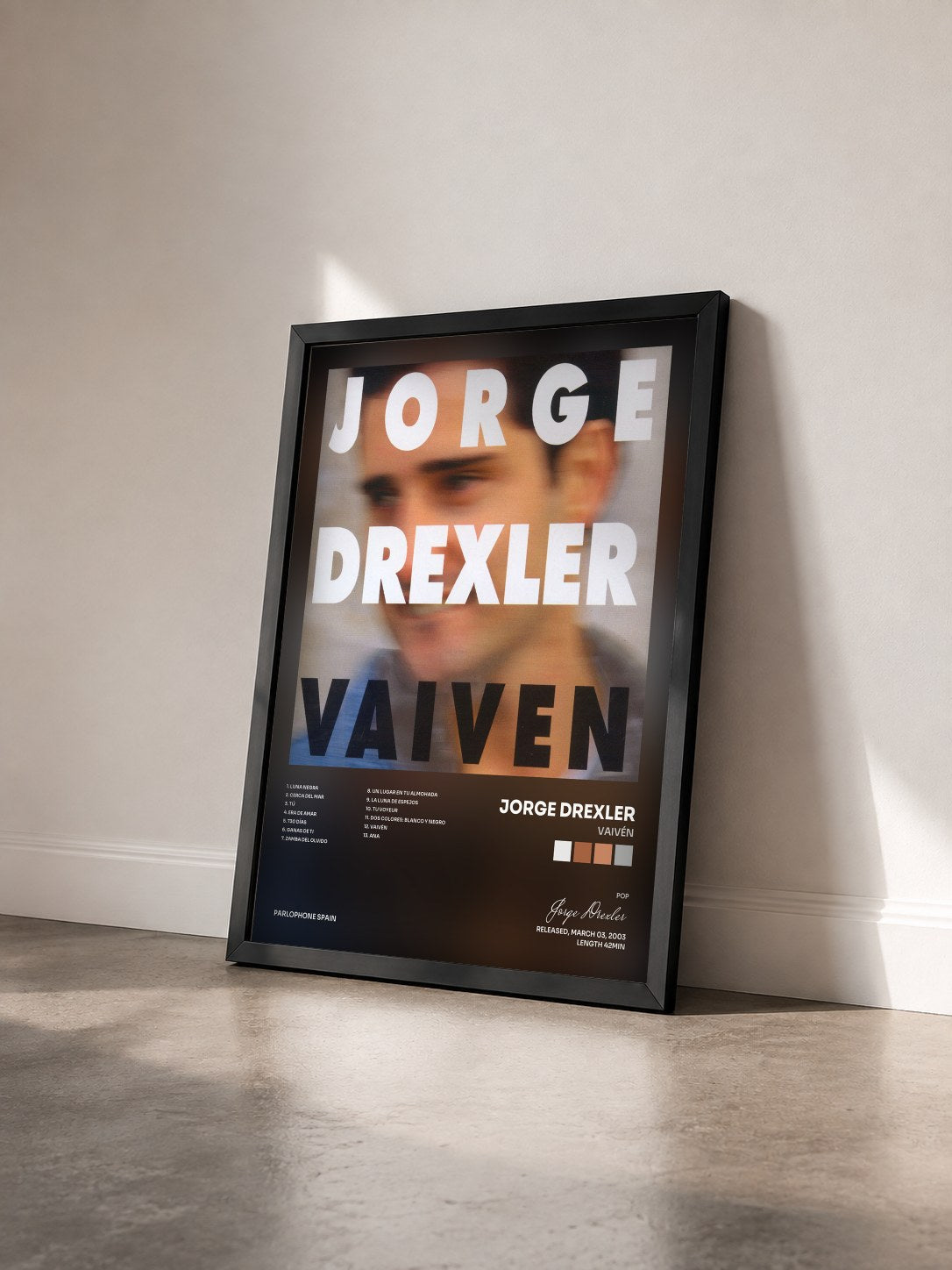 #noir Tableau de l'album Vaivén de Jorge Drexler vu de trois quarts, cadre noir