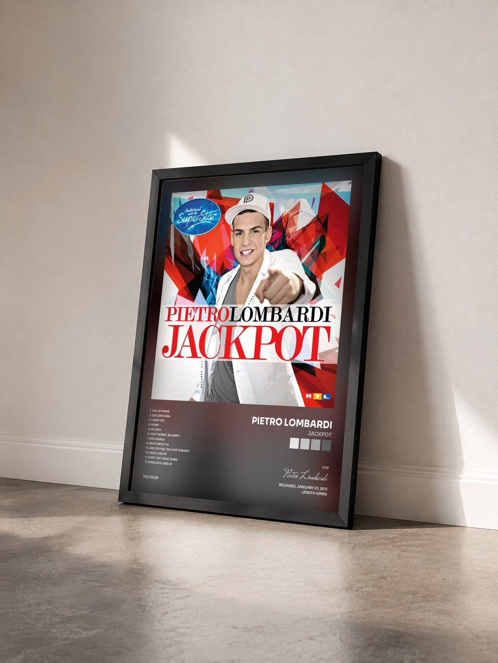 #noir Tableau de l'album Jackpot de Pietro Lombardi vu de trois quarts, cadre noir
