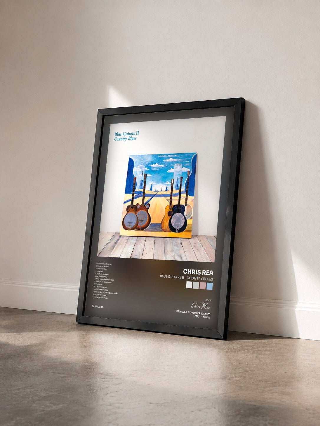 #noir Tableau de l'album Blue Guitars II - Country Blues de Chris Rea vu de trois quarts, cadre noir
