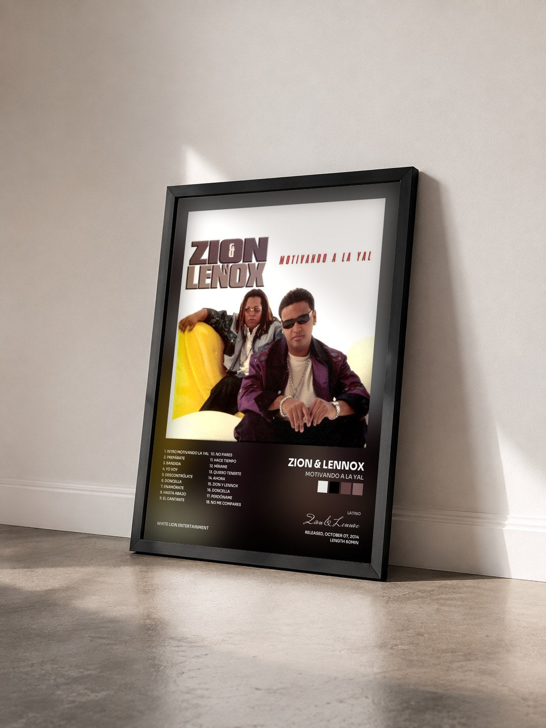 #noir Tableau de l'album Motivando a la Yal de Zion & Lennox vu de trois quarts, cadre noir
