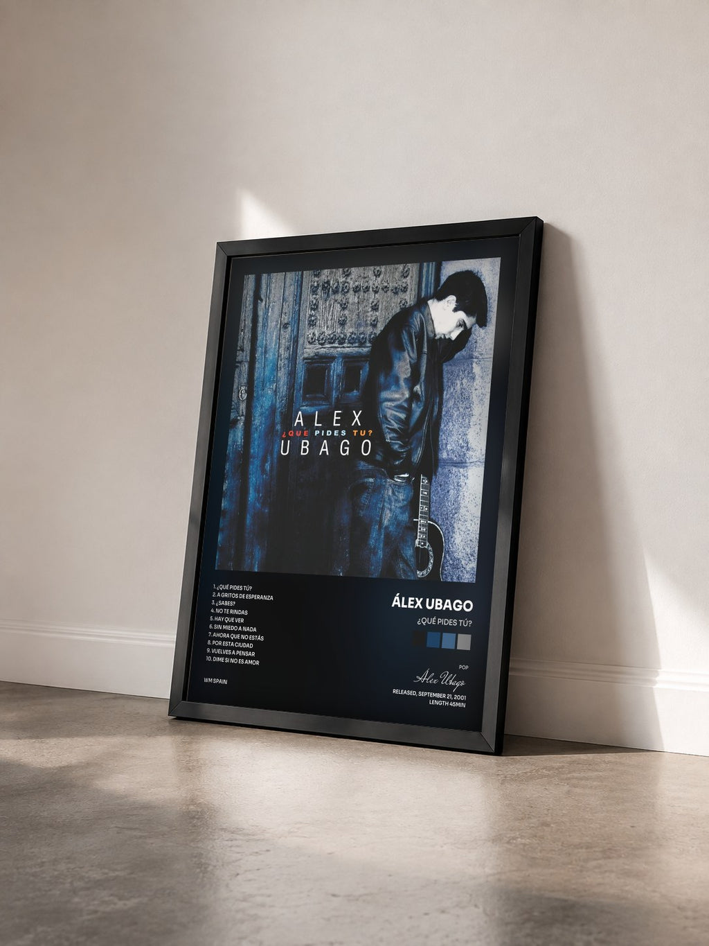 #noir Tableau de l'album ¿Qué pides tú? de Álex Ubago vu de trois quarts, cadre noir