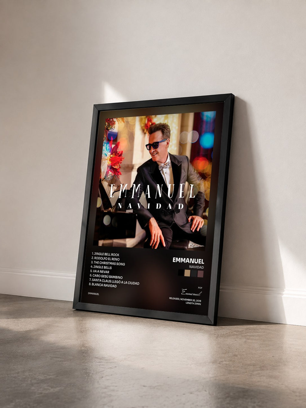 #noir Tableau de l'album Navidad de Emmanuel vu de trois quarts, cadre noir
