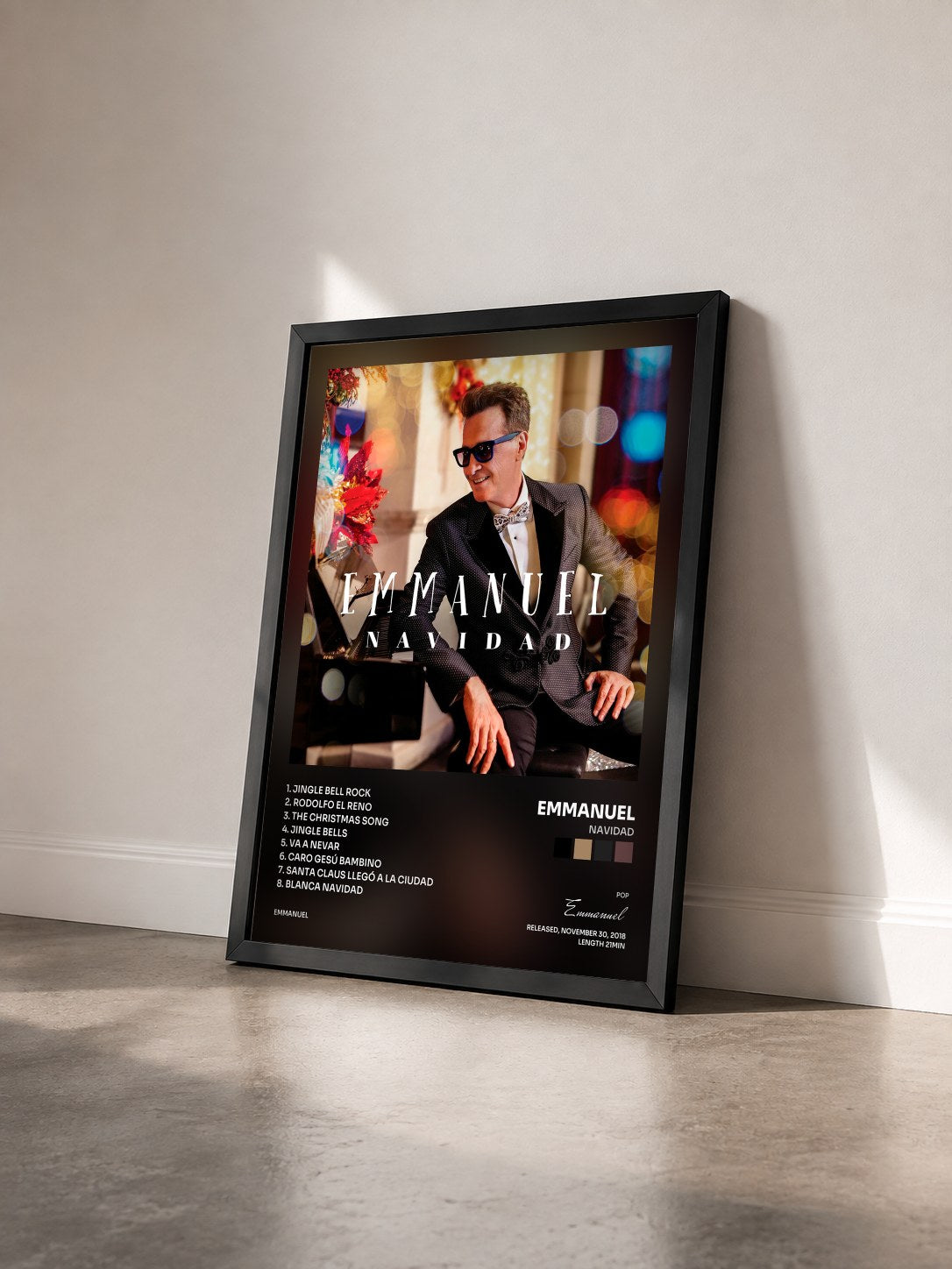 #noir Tableau de l'album Navidad de Emmanuel vu de trois quarts, cadre noir