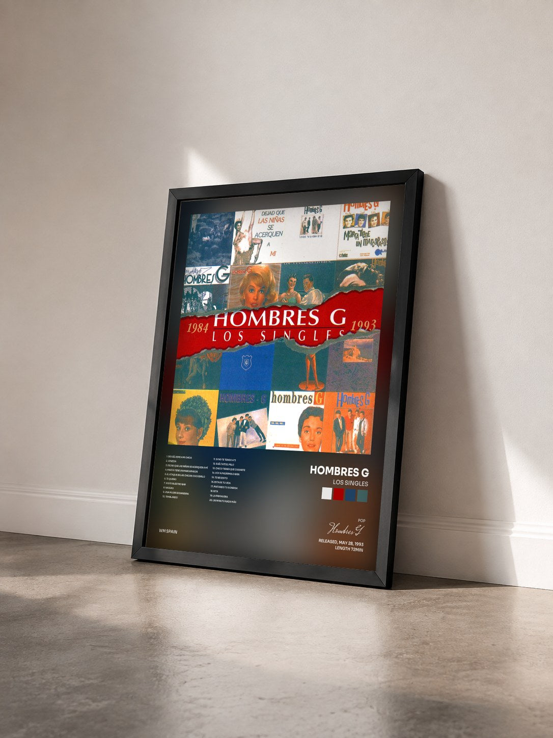 #noir Tableau de l'album Los Singles de Hombres G vu de trois quarts, cadre noir