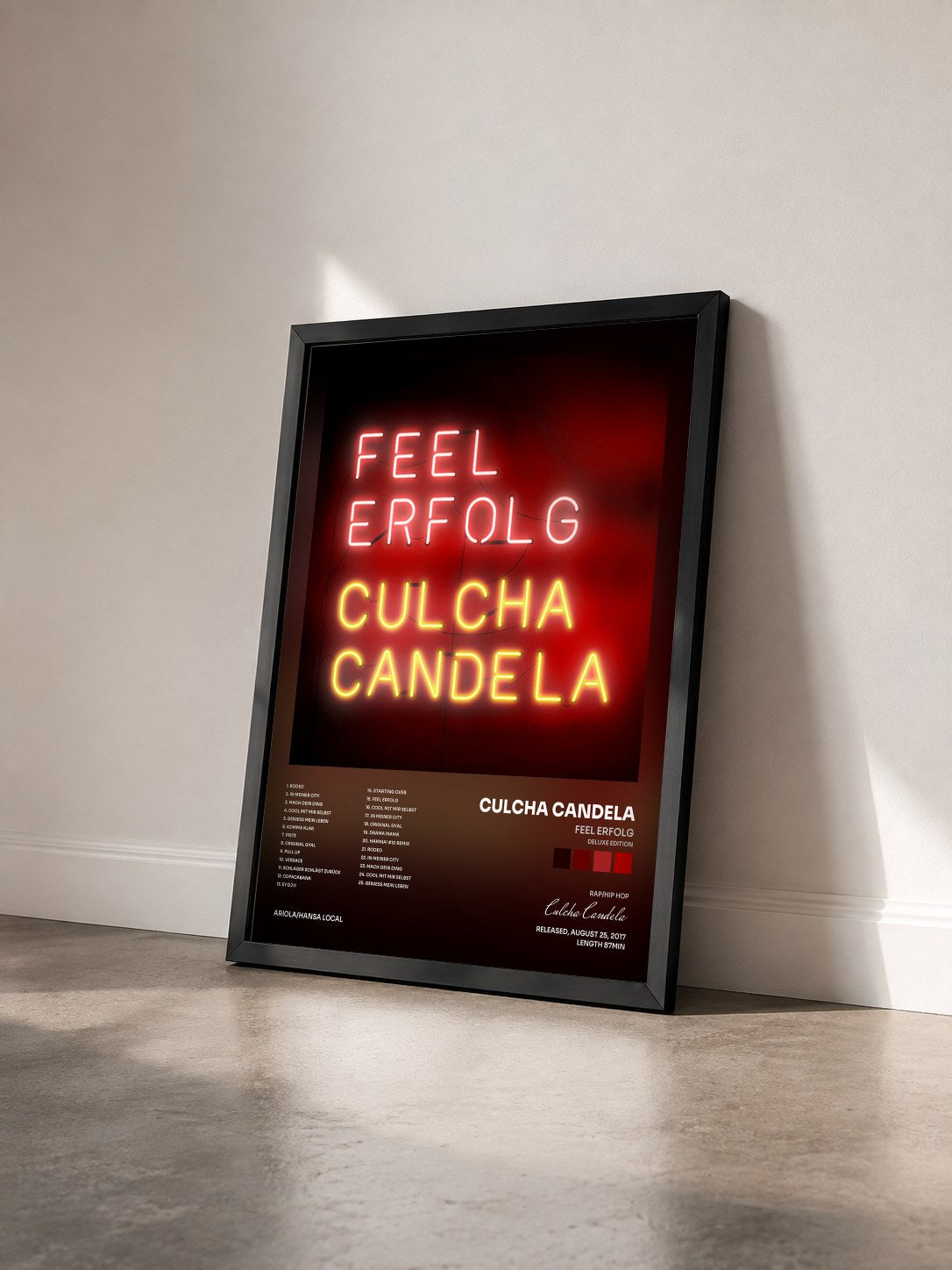 #noir Tableau de l'album Feel Erfolg (Deluxe Edition) de Culcha Candela vu de trois quarts, cadre noir