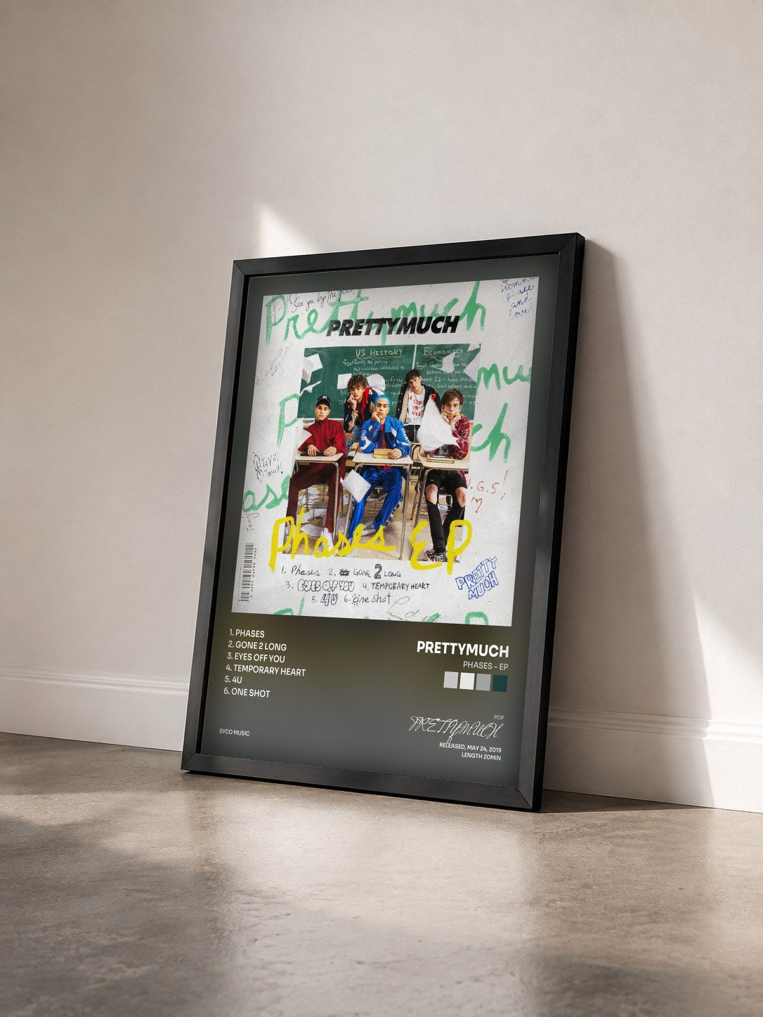 #noir Tableau de l'album Phases - EP de PRETTYMUCH vu de trois quarts, cadre noir