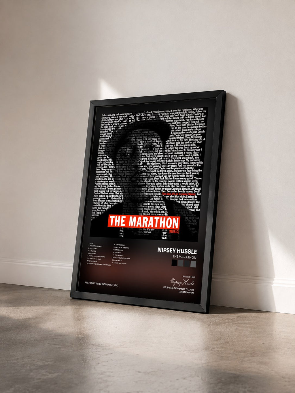 #noir Tableau de l'album The Marathon de Nipsey Hussle vu de trois quarts, cadre noir