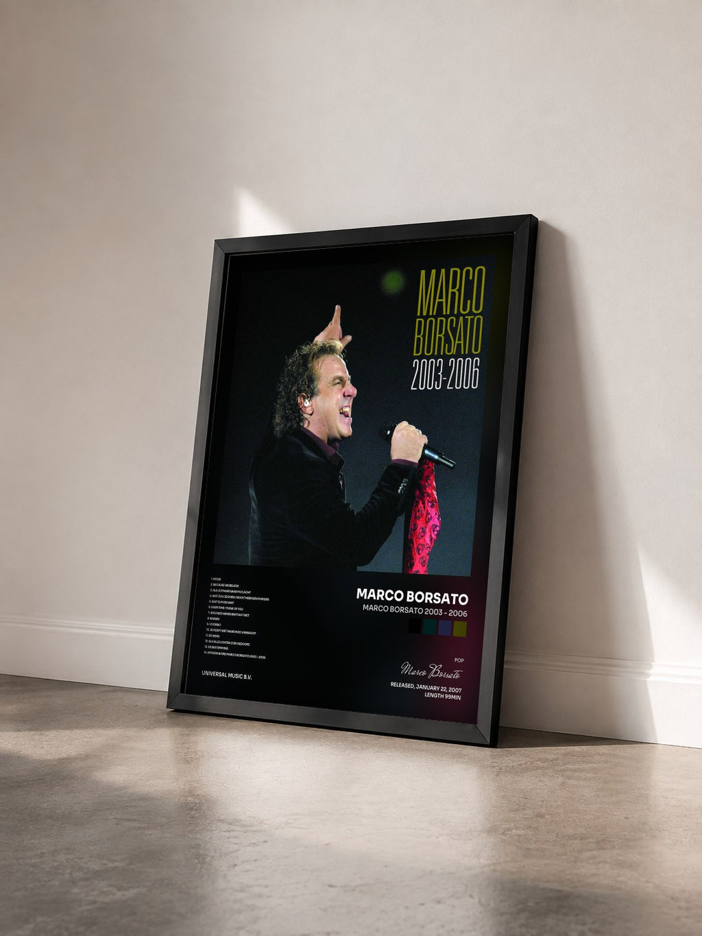 #noir Tableau de l'album Marco Borsato 2003 - 2006 de Marco Borsato vu de trois quarts, cadre noir
