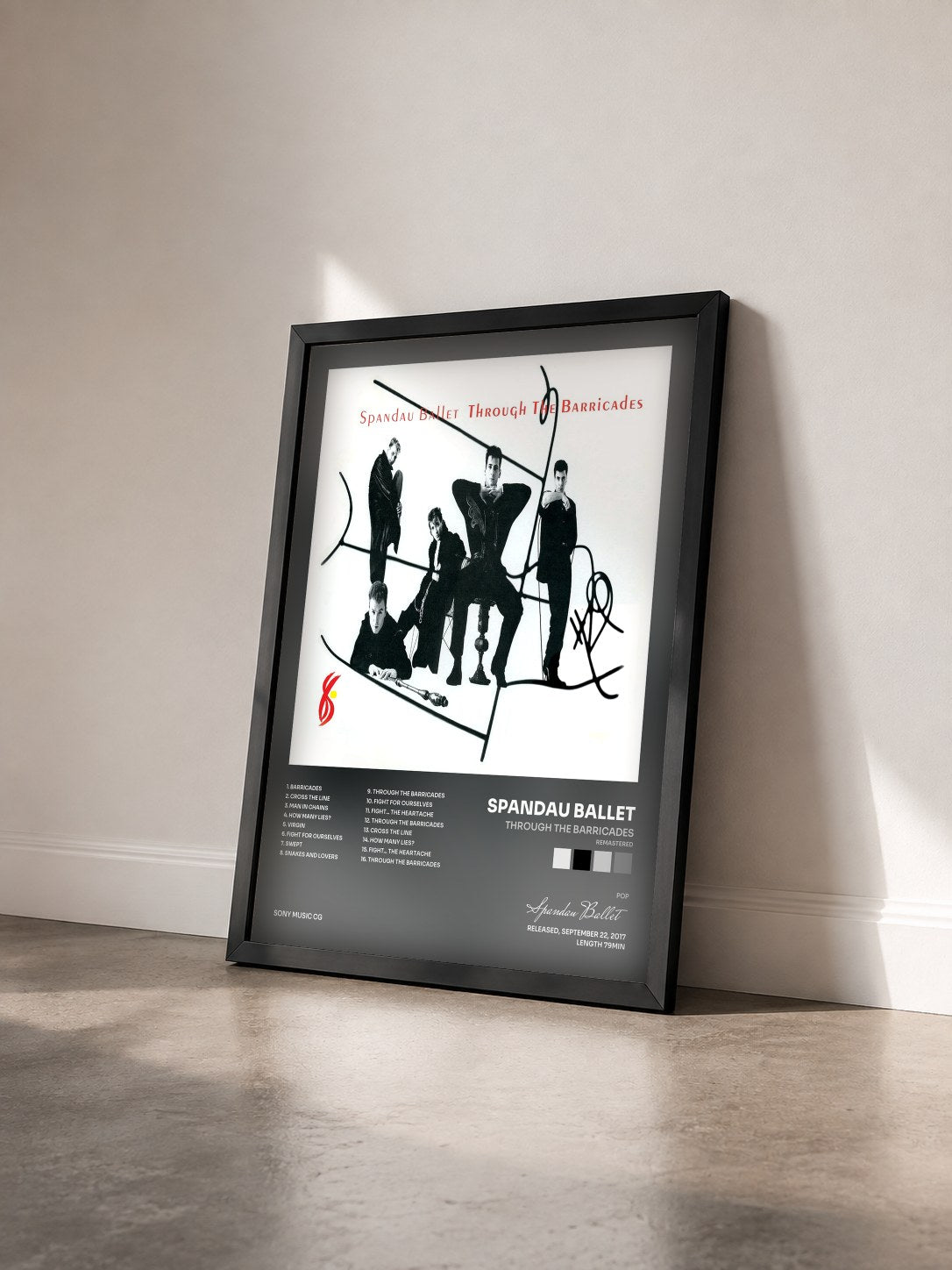 #noir Tableau de l'album Through the Barricades (Remastered) de Spandau Ballet vu de trois quarts, cadre noir