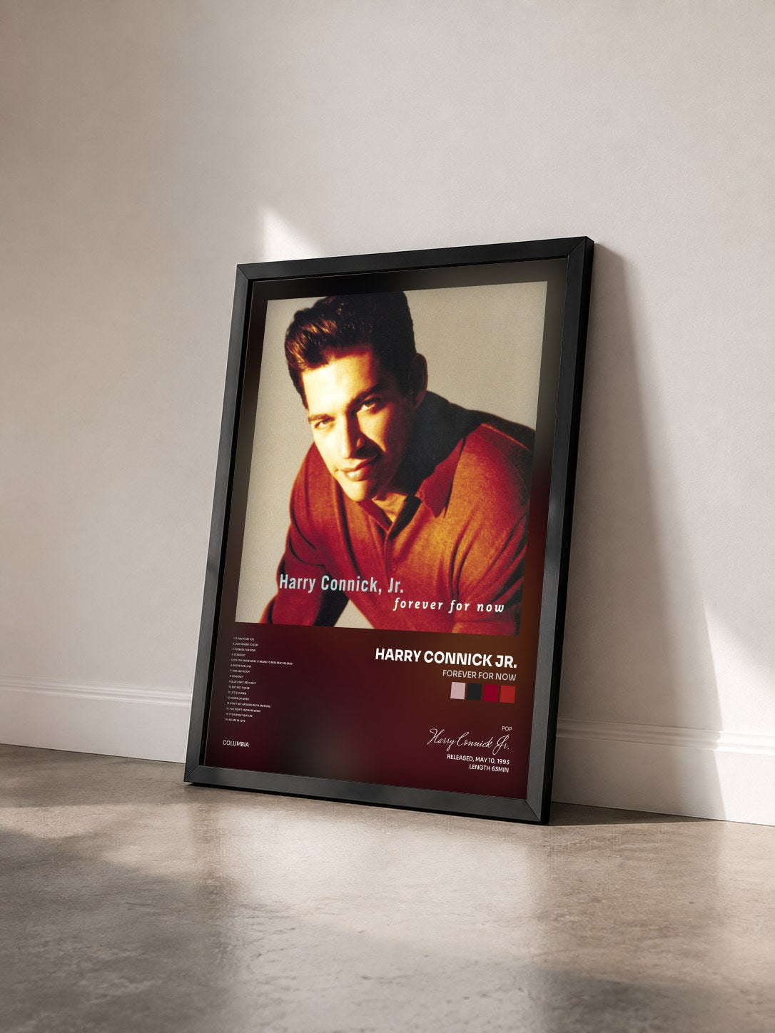 #noir Tableau de l'album FOREVER FOR NOW de Harry Connick Jr. vu de trois quarts, cadre noir