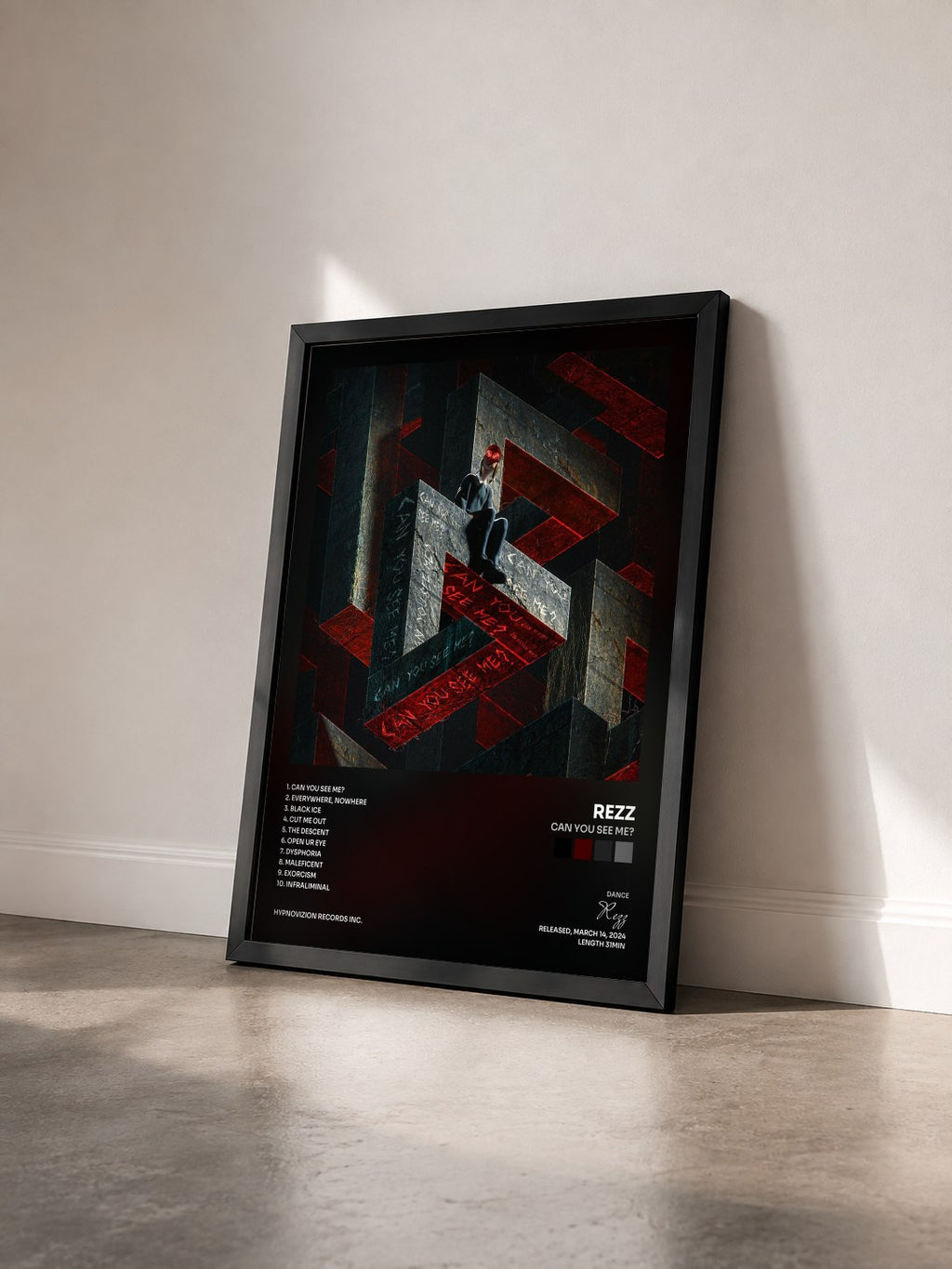 #noir Tableau de l'album CAN YOU SEE ME? de Rezz vu de trois quarts, cadre noir