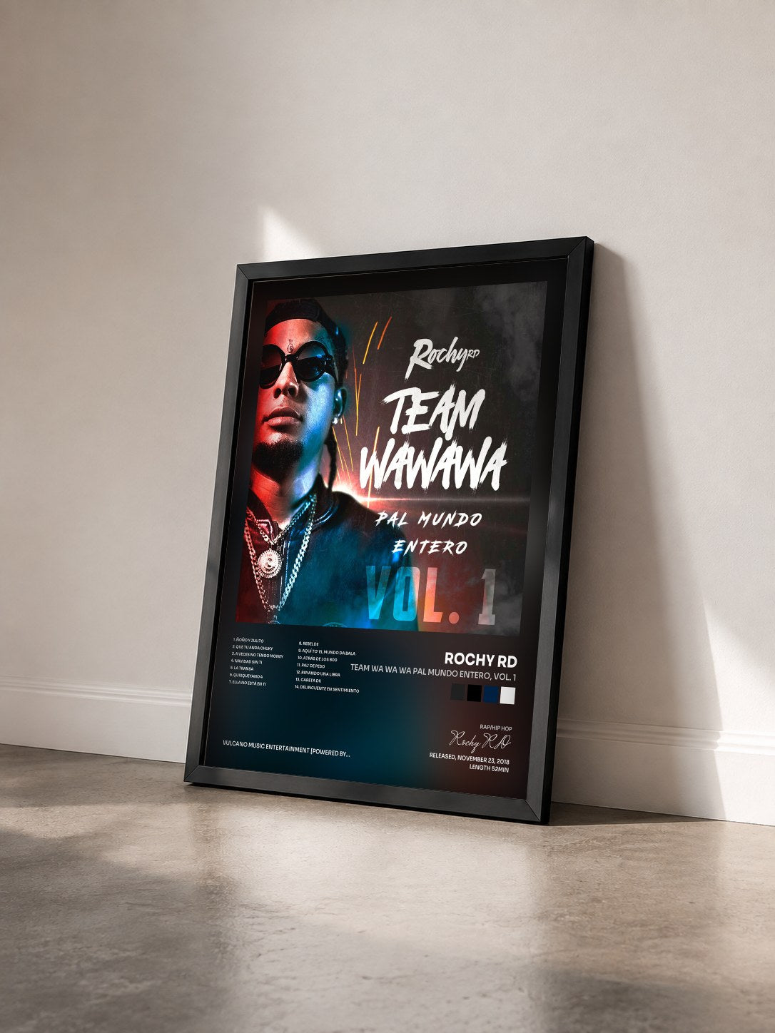#noir Tableau de l'album Team Wa Wa Wa Pal Mundo Entero, Vol. 1 de Rochy RD vu de trois quarts, cadre noir