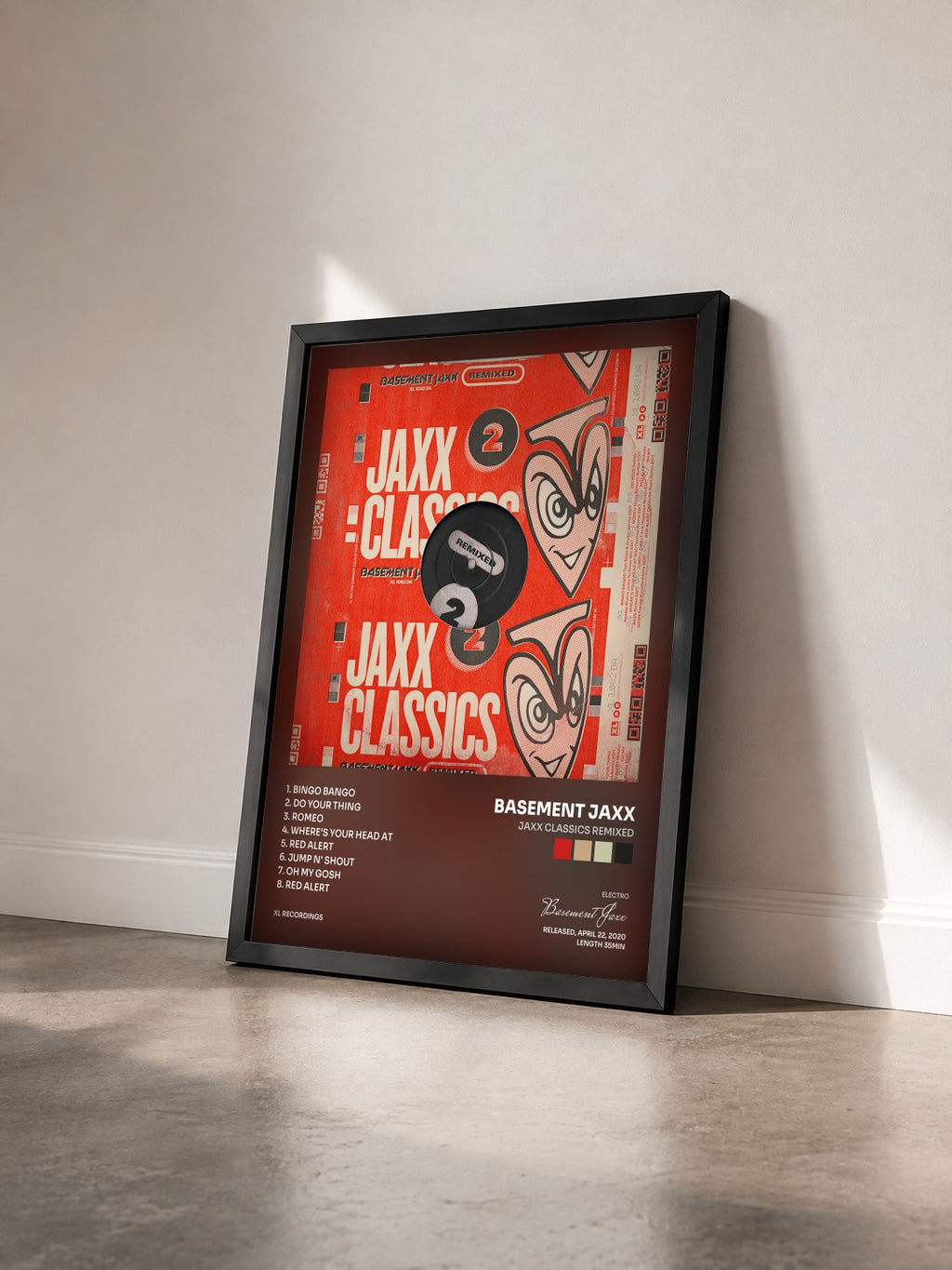 #noir Tableau de l'album Jaxx Classics Remixed de Basement Jaxx vu de trois quarts, cadre noir