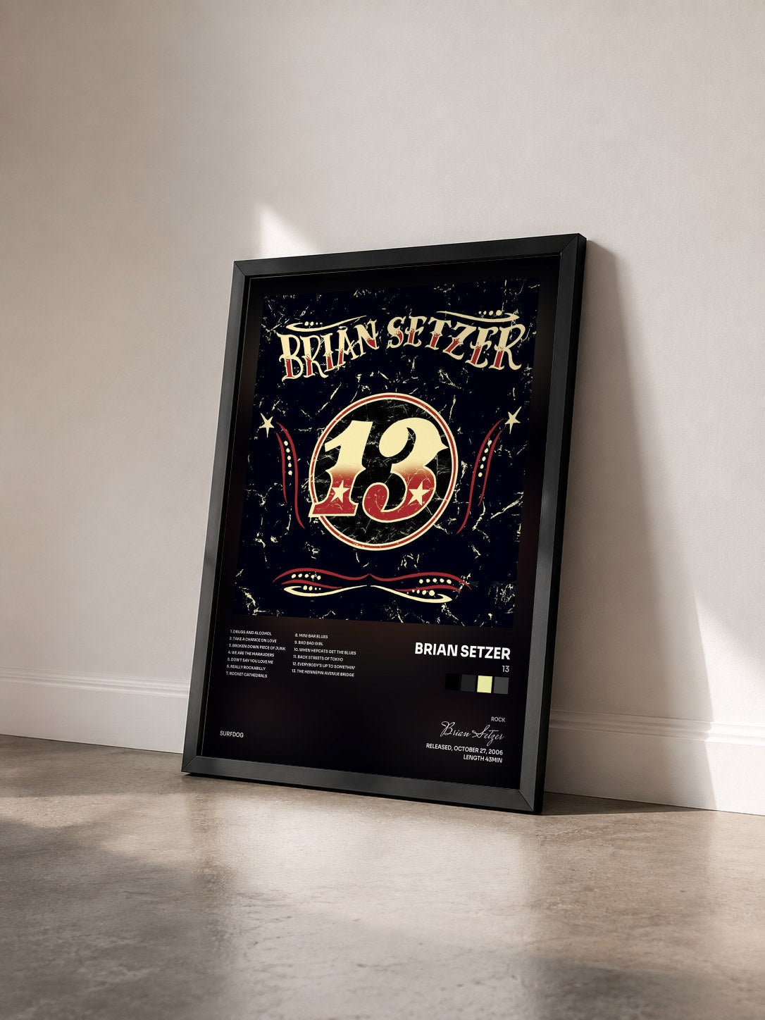 #noir Tableau de l'album 13 de Brian Setzer vu de trois quarts, cadre noir