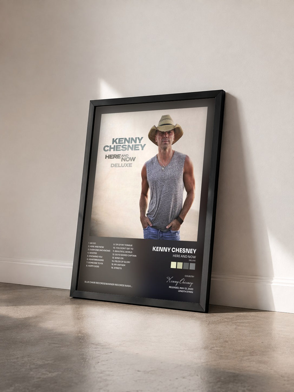 #noir Tableau de l'album Here And Now (Deluxe) de Kenny Chesney vu de trois quarts, cadre noir