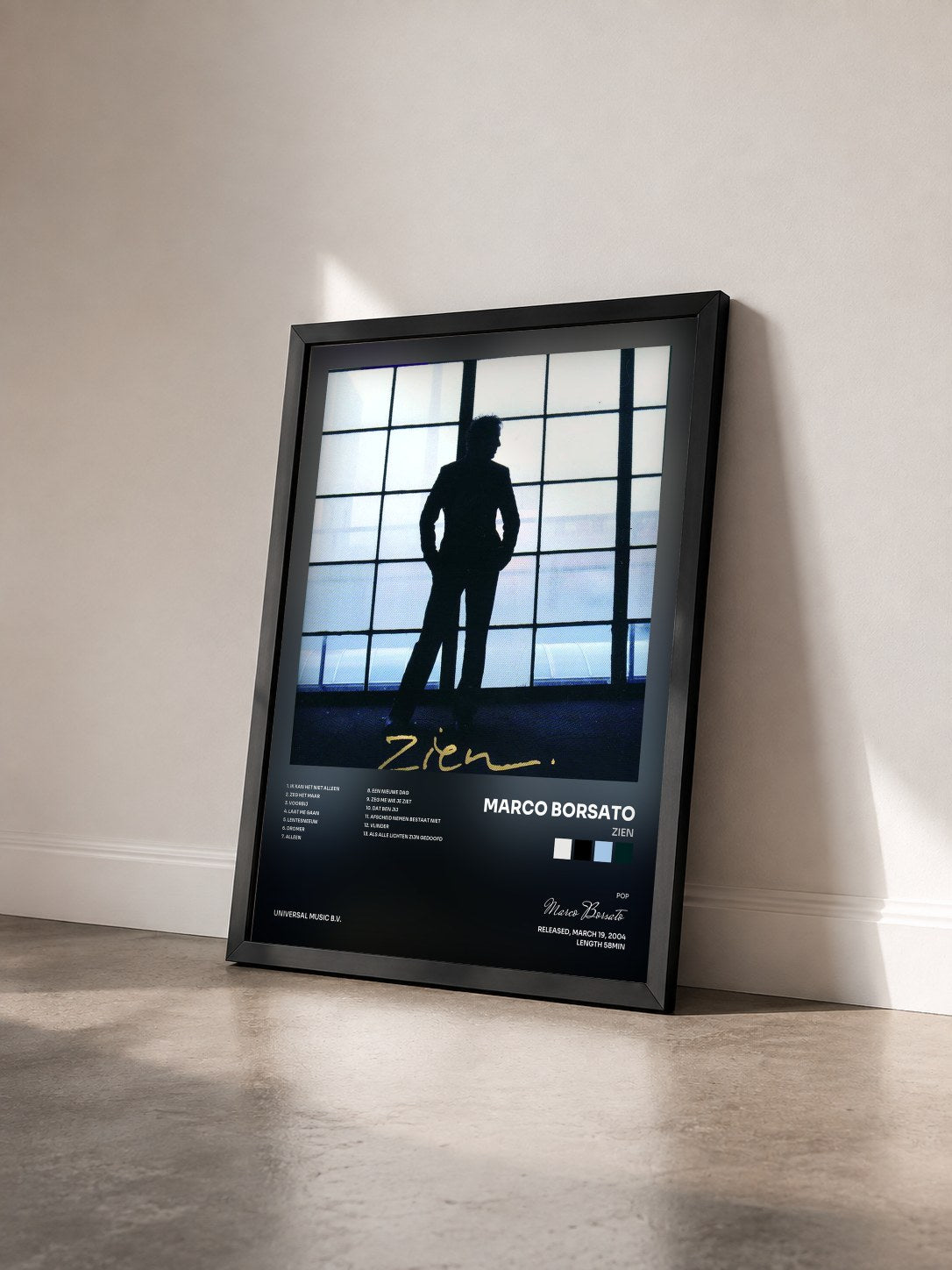 #noir Tableau de l'album Zien de Marco Borsato vu de trois quarts, cadre noir