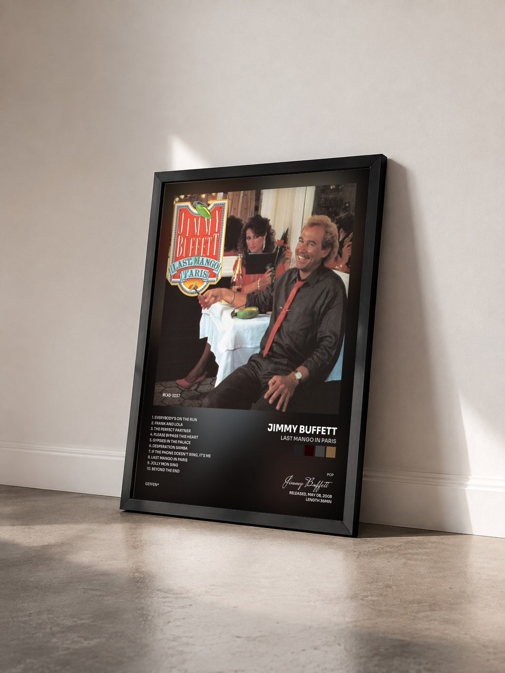 #noir Tableau de l'album Last Mango In Paris de Jimmy Buffett vu de trois quarts, cadre noir