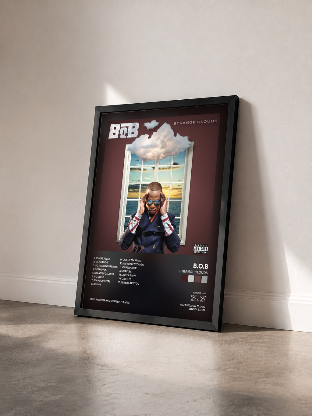 #noir Tableau de l'album Strange Clouds de B.o.B vu de trois quarts, cadre noir