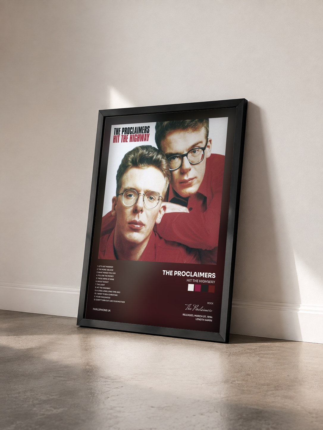 #noir Tableau de l'album Hit the Highway de The Proclaimers vu de trois quarts, cadre noir