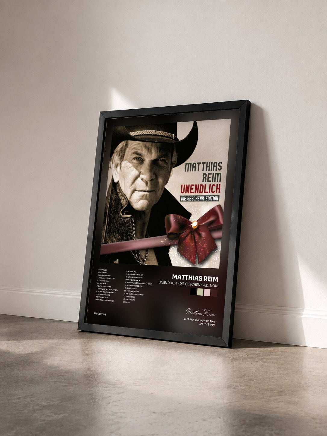 #noir Tableau de l'album Unendlich - Die Geschenk-Edition de Matthias Reim vu de trois quarts, cadre noir