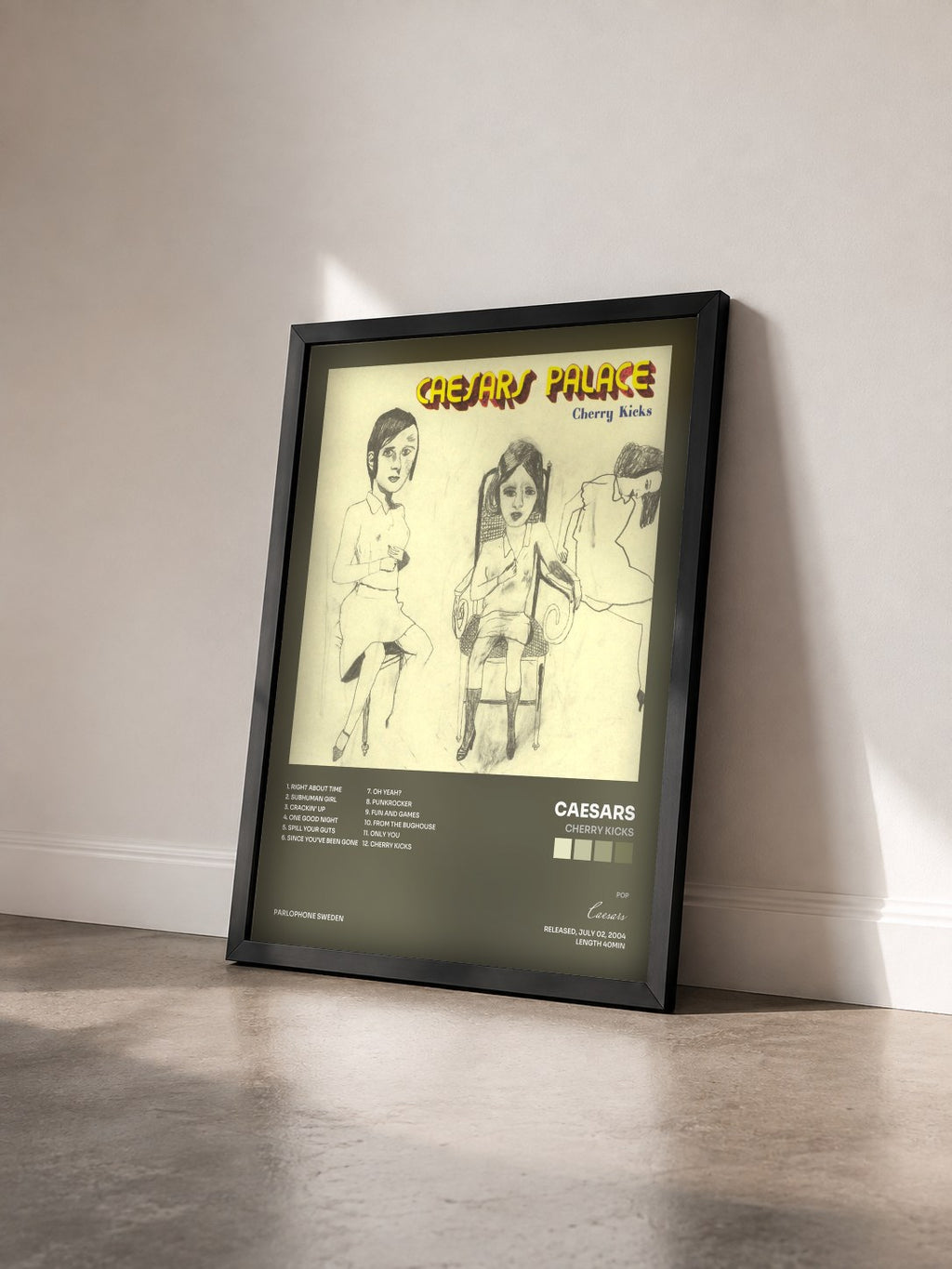 #noir Tableau de l'album Cherry Kicks de Caesars vu de trois quarts, cadre noir