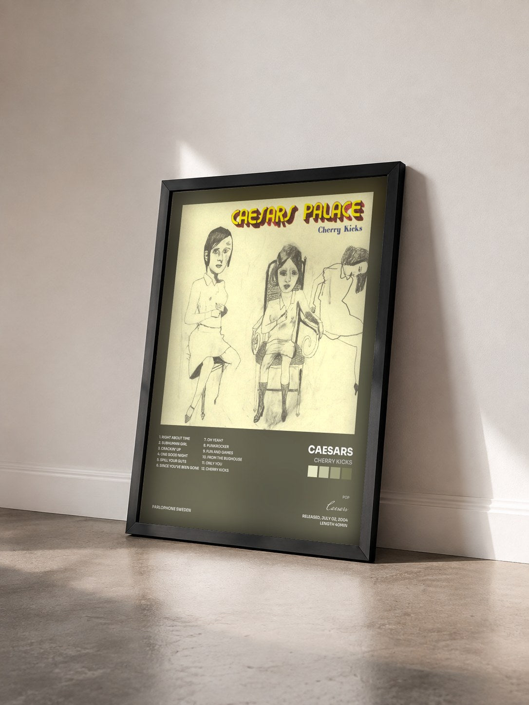 #noir Tableau de l'album Cherry Kicks de Caesars vu de trois quarts, cadre noir