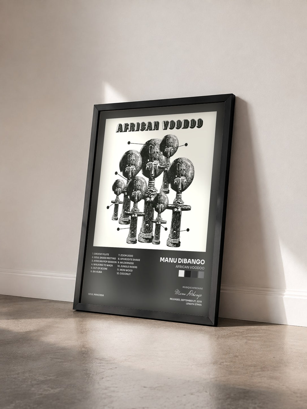 #noir Tableau de l'album African Voodoo de Manu Dibango vu de trois quarts, cadre noir