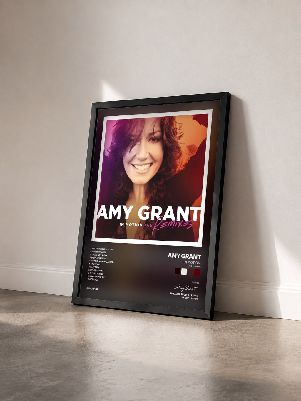 #noir Tableau de l'album In Motion (The Remixes) de Amy Grant vu de trois quarts, cadre noir