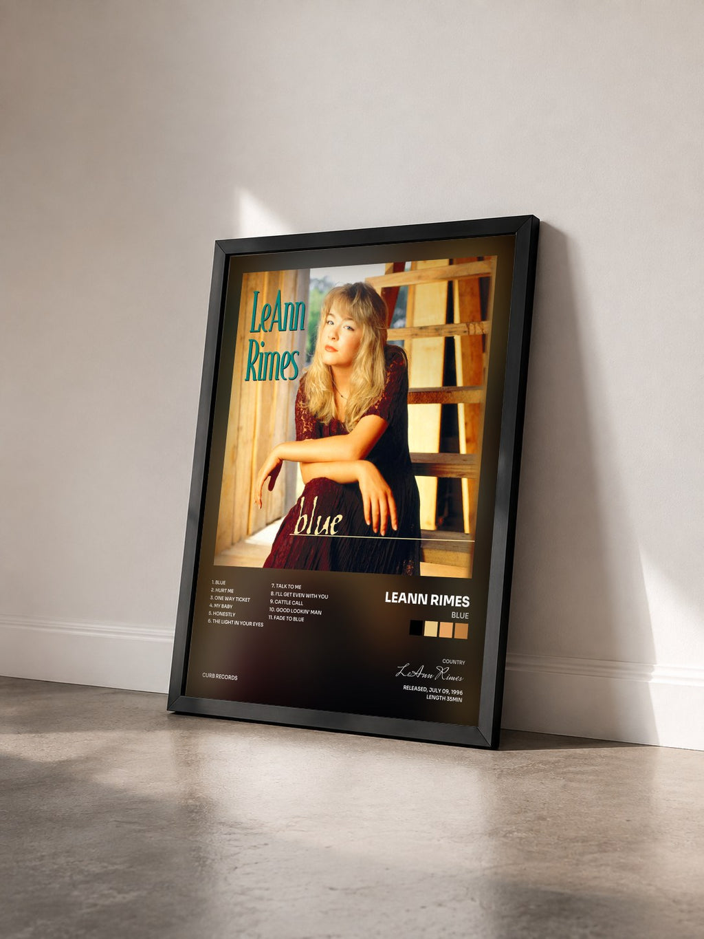 #noir Tableau de l'album Blue de LeAnn Rimes vu de trois quarts, cadre noir
