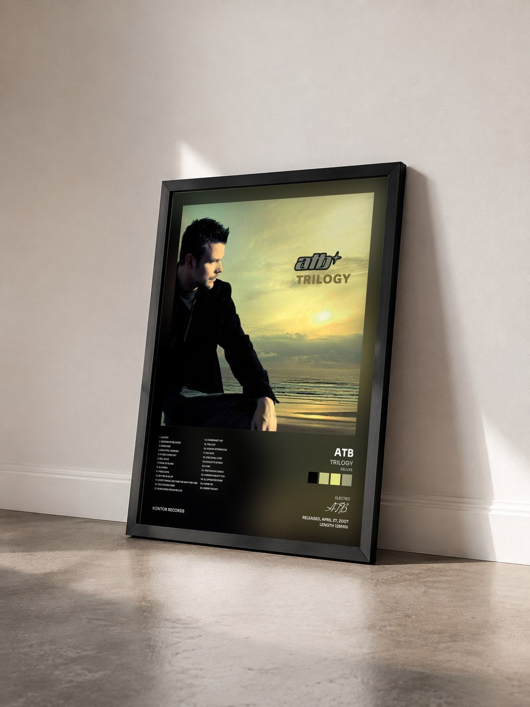 #noir Tableau de l'album Trilogy (Deluxe) de ATB vu de trois quarts, cadre noir