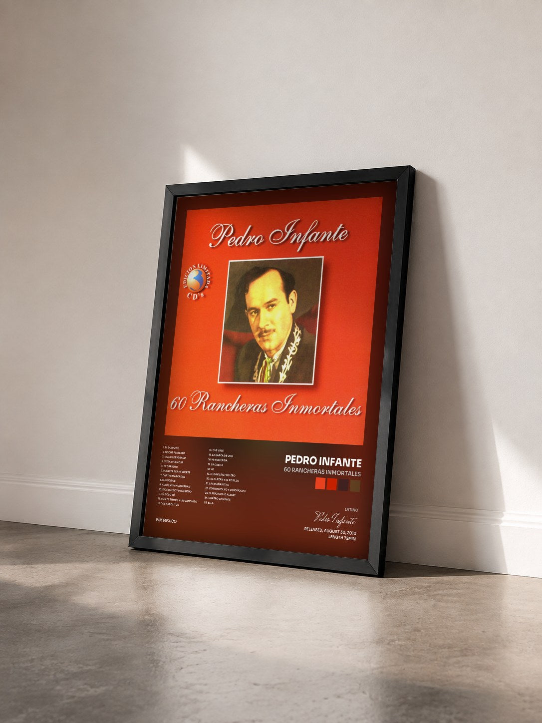 #noir Tableau de l'album 60 Rancheras Inmortales de Pedro Infante vu de trois quarts, cadre noir