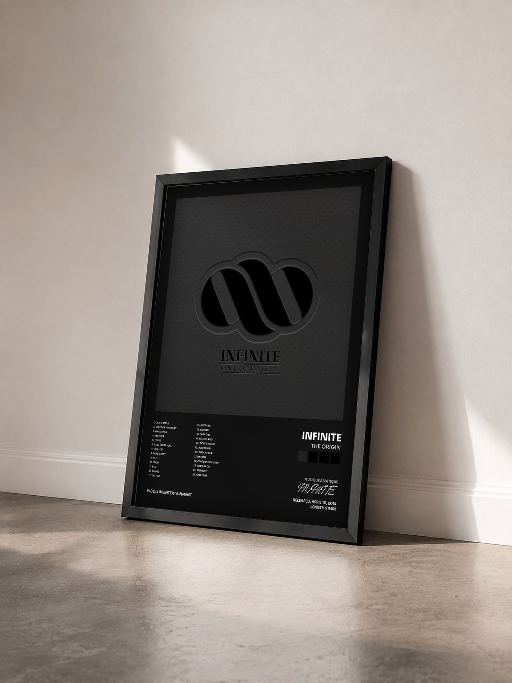 #noir Tableau de l'album The Origin de INFINITE vu de trois quarts, cadre noir