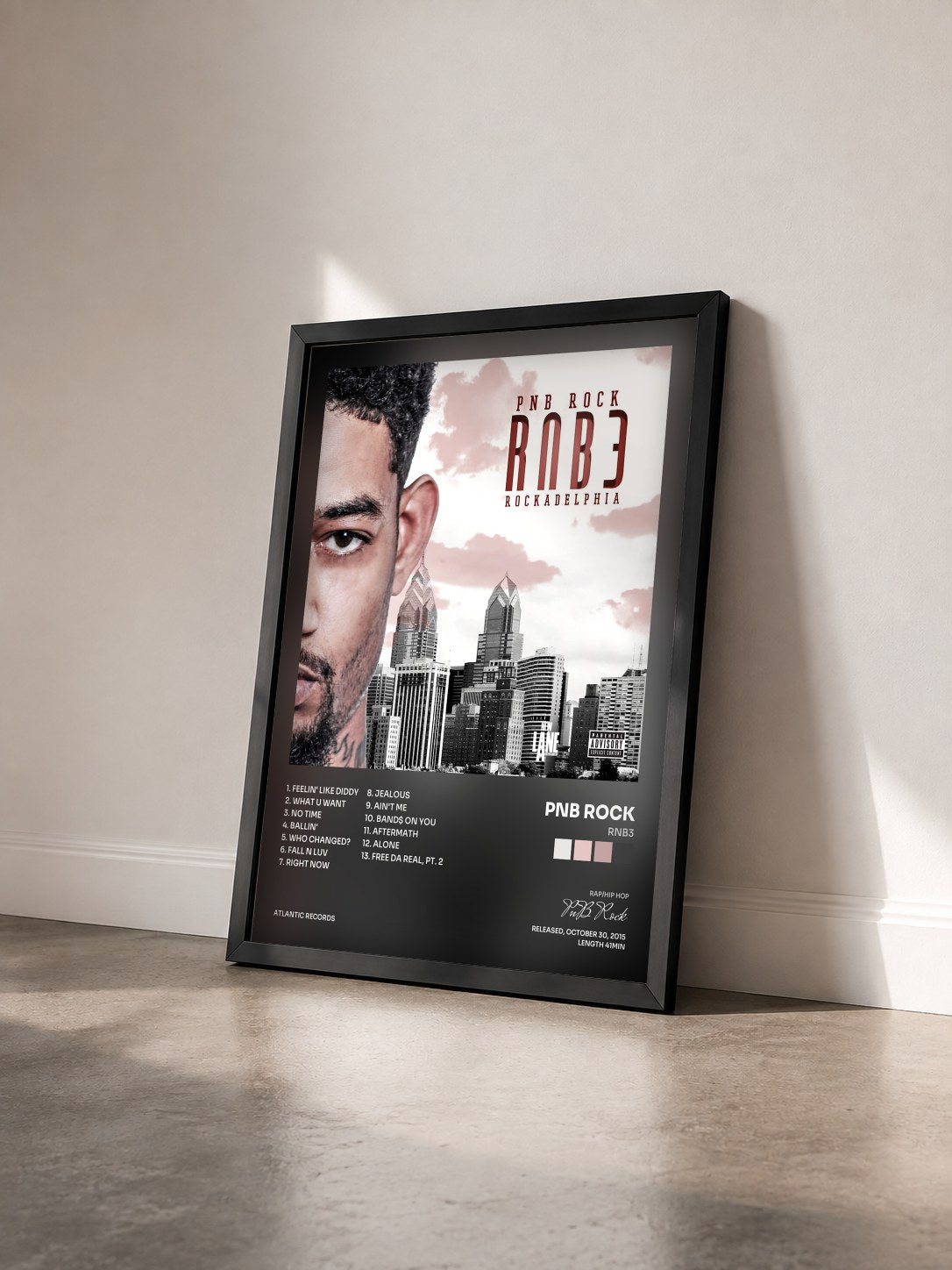 #noir Tableau de l'album RNB3 de PnB Rock vu de trois quarts, cadre noir