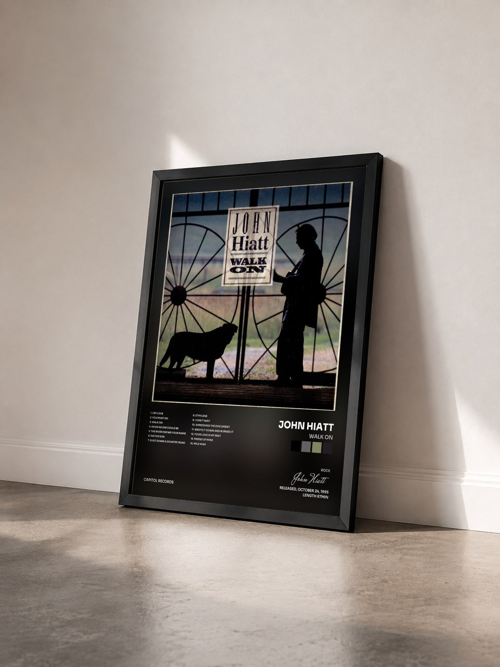 #noir Tableau de l'album Walk On de John Hiatt vu de trois quarts, cadre noir