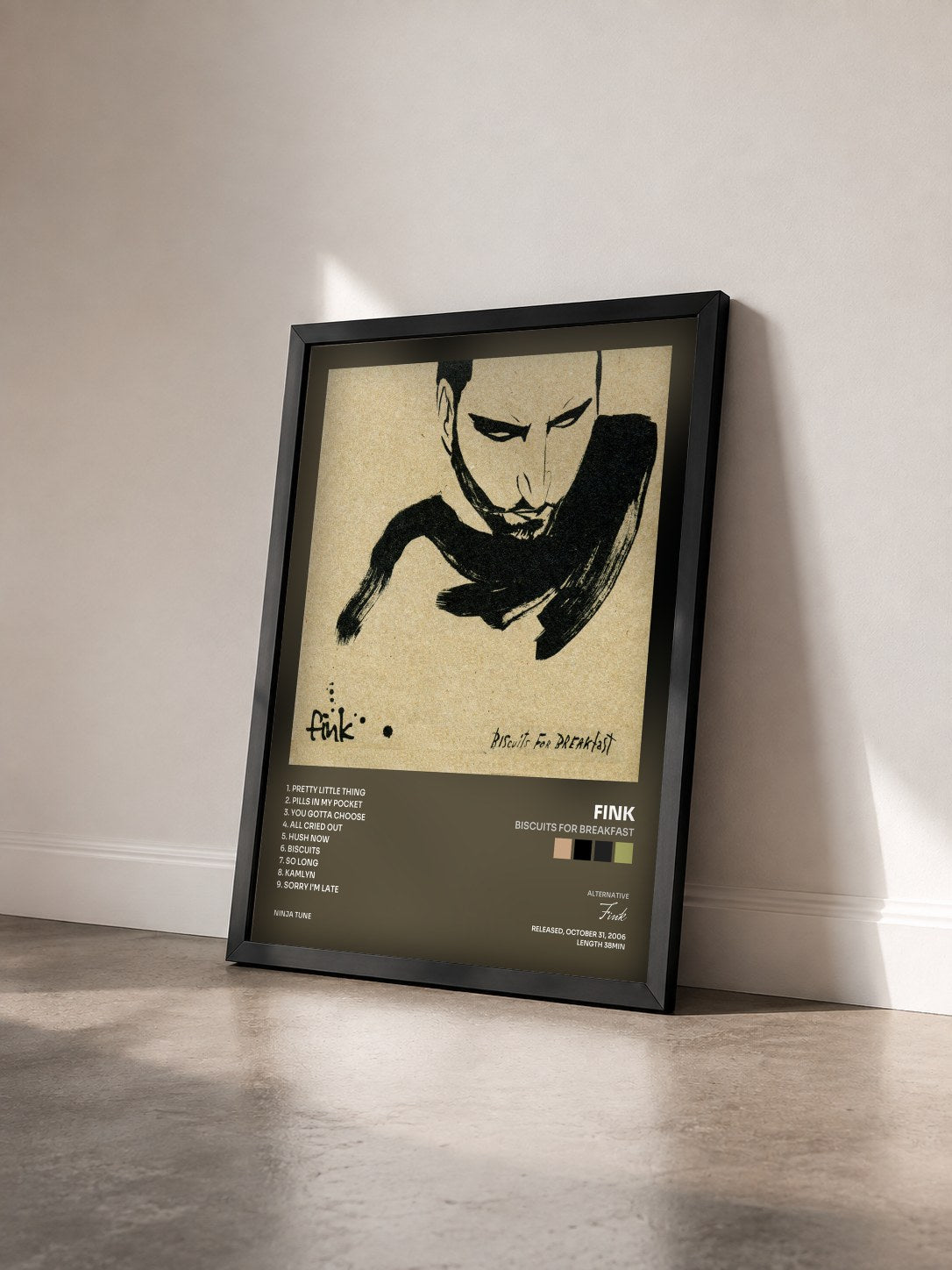 #noir Tableau de l'album Biscuits For Breakfast de Fink vu de trois quarts, cadre noir
