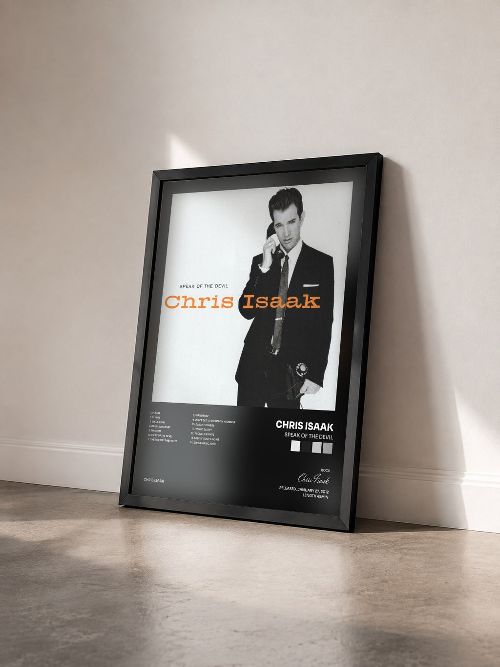 #noir Tableau de l'album Speak Of The Devil de Chris Isaak vu de trois quarts, cadre noir