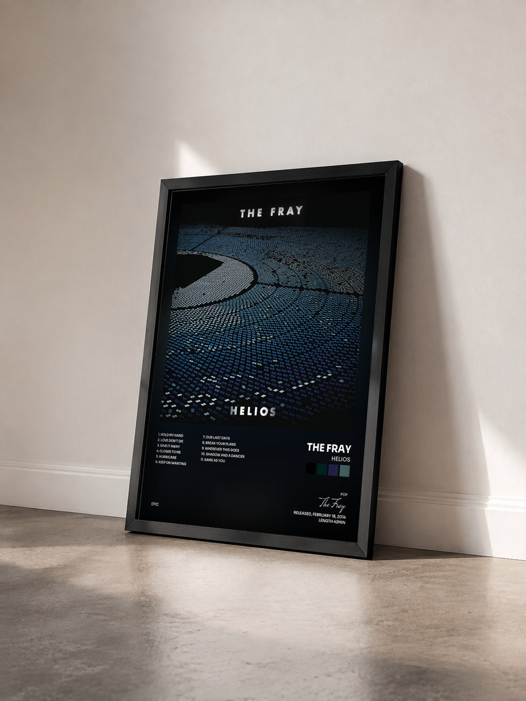 #noir Tableau de l'album Helios de The Fray vu de trois quarts, cadre noir